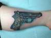 handgun tattoo