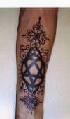 Heartagram tattoo