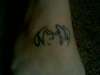 John lennon drawing on foot tattoo