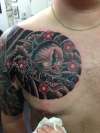 hannya chest panel tattoo