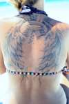 ANGEL WINGS WITH GOTH HALO tattoo