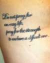 Bruce Lee quote on right ribcage tattoo