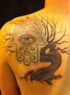 Hamsa and tree tattoo