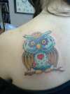 Hoots with color tattoo