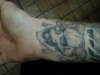 Horned skull tattoo