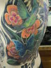 Hummingbird/Flowers tattoo
