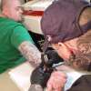 Mike Benneig Tattooing on Jason Griffith