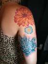 Sleeve of flowers tattoo