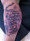 Tiger outlined tattoo