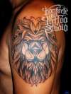 lion head stained glass tattoo