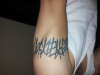 my name in tribal writing tattoo