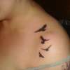 small black birds tattoo