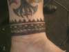 under wrist band tattoo