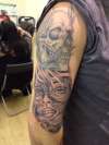 Arm sleeve tattoo