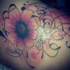 Flower coverup tattoo