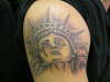 Statue of liberty head tattoo