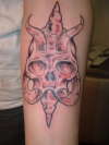 bob T skull thing tattoo
