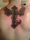 Cross cover up tattoo