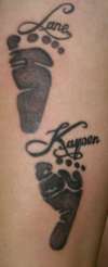 Footprints of 2 sons tattoo
