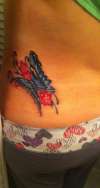 Left lower back butterfly tattoo