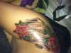 Piano scroll with roses tattoo