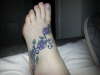 flowers on foot tattoo