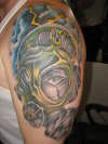 gas mask cover up of tribal tattoo