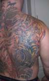 Right side of back by world renowned Frank Lee tattoo