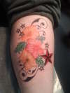 flowers n star on calf tattoo