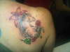 horse , roses and tiger Lilly tattoo