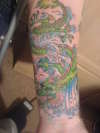 dragon on forearm tattoo