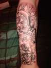timeless lower arm tattoo