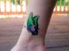 Ankle butterfly tattoo