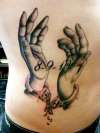 Black and grey hands tattoo