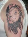 Lions head tattoo