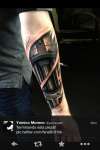 biomechanical arm tattoo
