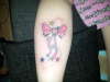 pink bow tattoo