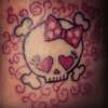 pink girly skull tattoo