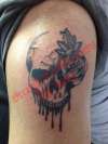 Skull and rose tattoo