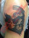 Skull cover up tattoo