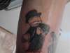 monopoly man tattoo