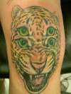 4 eyed leopard tattoo