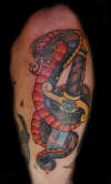 Cobra and a Dagger tattoo