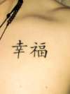 Happiness on chinese tattoo