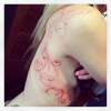 Pink uv ink tattoo