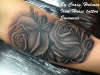 Rose tattoo by Craig Holmes