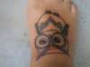 foot owl tattoo