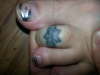Toe Ring tattoo