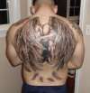 black and grey guardian angel wings religouse tattoo on the back