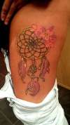healed dreamcatcher tattoo